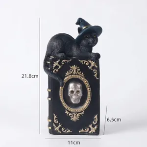 Halloween wizard cat sitting on magic book resin decor showing product dimensions