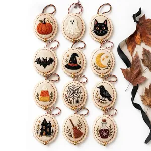 Set of 12 handmade Halloween embroidered ornaments featuring ghost pumpkin and cat