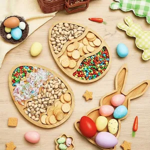 Bamboo Easter snack trays in egg and rabbit shapes with pistachios, cookies and candies