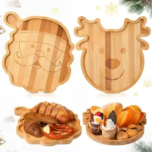 Close-up of Christmas-themed Santa and reindeer bamboo trays with assorted pastries