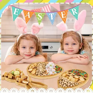 Detailed view of bunny and egg shaped bamboo snack trays filled with assorted holiday treats