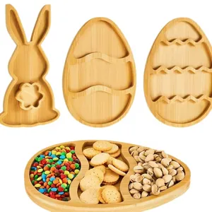 Bamboo Easter egg and bunny snack tray set filled with colorful candies and nuts