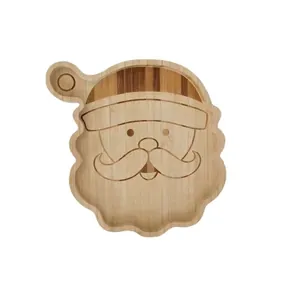 Close-up of Santa Claus shaped bamboo tray for Christmas snacks and candies