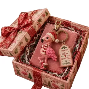 Llavero de flamenco de Navidad con caja de regalo rosa festiva y etiqueta brillante de adorno