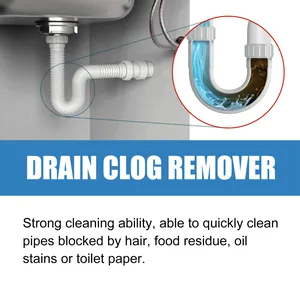 Macro view showing drain clog remover effectively clearing hair and food residue in a P-trap pipe.