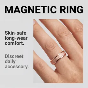Close-up of a rose gold frosted magnetic ring worn on a finger for daily style