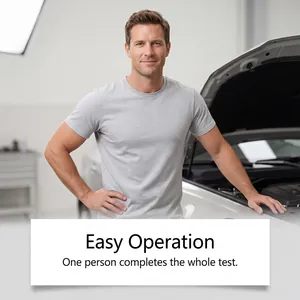Professional mechanic demonstrating easy operation of cylinder head gasket test fluid on car