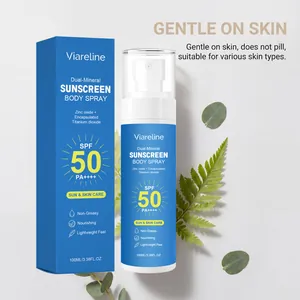 Close-up detail of Viareline SPF 50 Mineral Sunscreen Body Spray set against botanical leaves