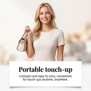 Caucasian model with a chic handbag demonstrating the portable size of the body spray