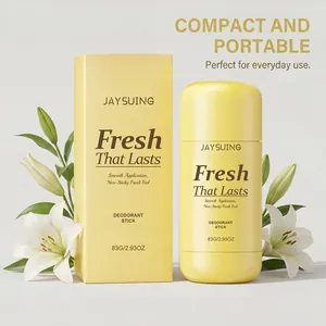 Detailed macro view of yellow JAYSUING deodorant stick and its box among white lilies