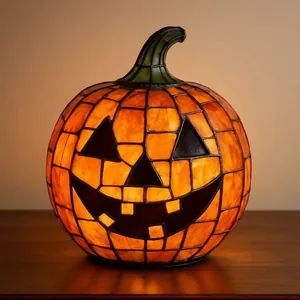 Close-up of a Tiffany style stained glass pumpkin lantern for Halloween interior decor