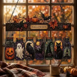 Detailed view of Halloween stained glass suncatcher with festive pumpkin and ghost motifs
