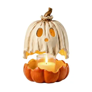 Spooky Halloween pumpkin ghost ceramic candle holder with lit candle for home decor
