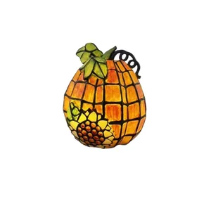 Tiffany style stained glass pumpkin Halloween lamp featuring a vibrant sunflower pattern