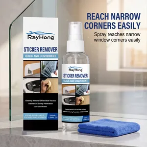 Primer plano de spray eliminador de adhesivos RayHong y caja con paño de limpieza azul