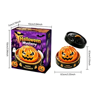 Detail view showing dimensions of the Halloween pumpkin squishy toy and its packaging.