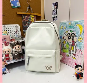 Minimalist cream white high capacity backpack for female students in a lifestyle room setting
