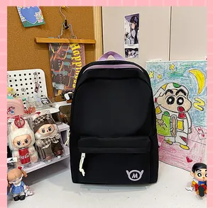 2025 Minimalist black student backpack with large capacity and purple zipper detail, front view
