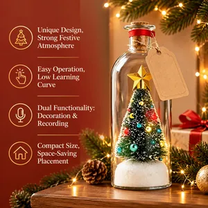 Miniature Christmas tree inside a glass wishing bottle jar for festive home decoration