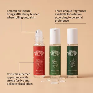 Trois huiles à bille aux herbes, texture lisse, flacons en verre avec décorations de Noël