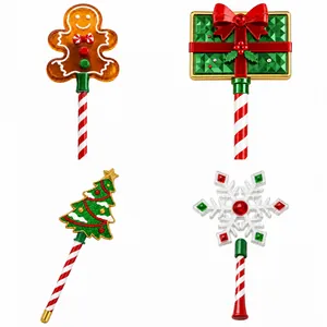 Set di 4 oggetti di scena natalizi: omino di pan di zenzero, albero e fiocco di neve.