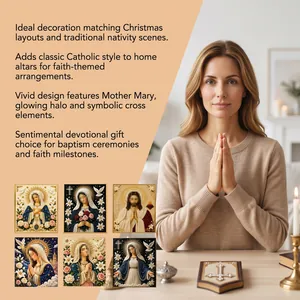 Caucasian woman praying next to various religious DIY diamond painting kit samples