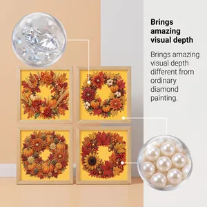 Detailed view of DIY diamond painting featuring 3D pearls and faceted stones for depth.