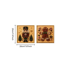Close-up of Christmas pearl painting kit showing 20cm nutcracker and gingerbread man art.