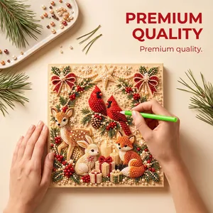 Close-up of Christmas pearl painting DIY kit with reindeer and bird patterns