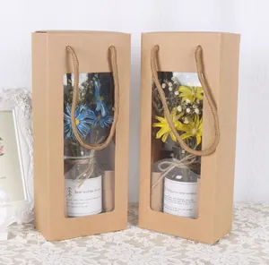 Zwei Trockenblumen Glasflaschen Geschenkboxen mit Kraftpapierverpackung und Kordelgriff