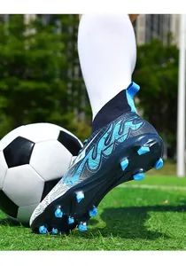 Detailed view of high-top soccer cleats featuring durable blue studs for grass ground.