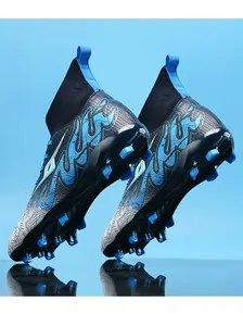 Detailed side and sole view of blue and black youth high-top soccer cleats for grass training
