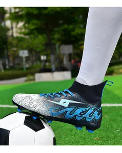 Close-up side view of professional blue high-top soccer cleats resting on a soccer ball