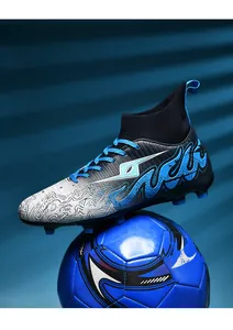 Blue and black high-top soccer cleat on a football with flame patterns
