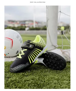 Professional close-up of kids' TF stud soccer boots featuring vibrant neon yellow stripes