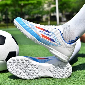 Professional colorful turf soccer shoes with breathable upper and durable grip sole