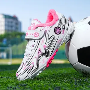 Warm fleece-lined children's soccer shoes with turf cleats for youth outdoor training