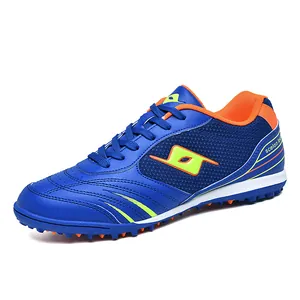 Professional blue and orange TF turf soccer shoes with non-slip rubber studs for training