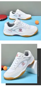 Detail shot of white professional table tennis shoes with anti-slip rubber sole and mesh