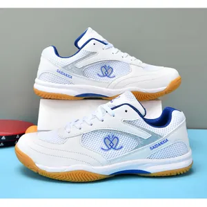 Detail view of professional athletic shoes featuring a heart-shaped logo and durable gum rubber sole.