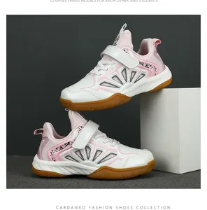 Professional breathable children's badminton shoes with pink accents and gum soles