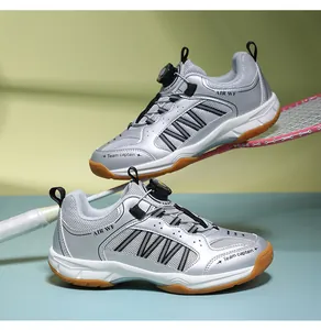 Detailed view of children's silver badminton shoes featuring a quick rotating buckle