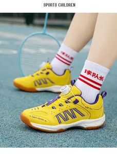 Detail of yellow breathable kids badminton sneakers with convenient rotary buckle design