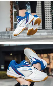 Close-up of lightweight badminton shoes with breathable mesh and gum rubber sole.