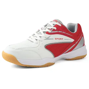 Detailed side profile of red and white professional badminton training sneakers