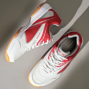 Red and white professional badminton shoes with breathable mesh and grip rubber sole