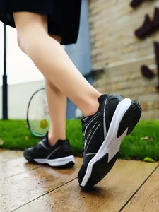 Close-up detail of black badminton shoes for men and kids during outdoor sports training