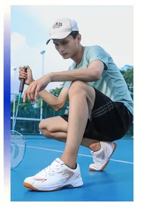 Professional breathable badminton shoes with non-slip sole worn by athlete on court