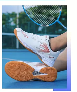 Detailed view of white lightweight badminton shoes with non-slip gum rubber sole design