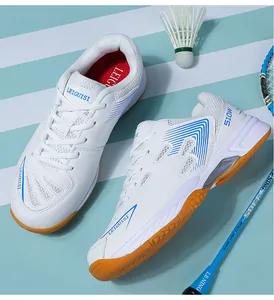 Professional white and blue badminton shoes featuring breathable mesh and anti-slip gum soles.